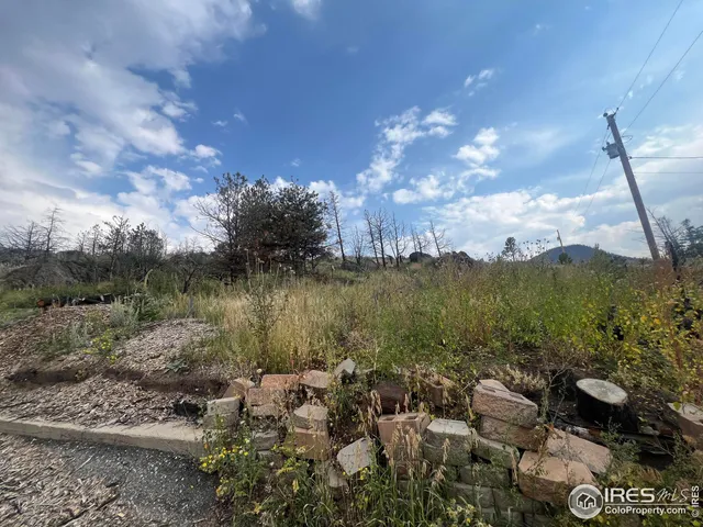 a view of a lake with green space