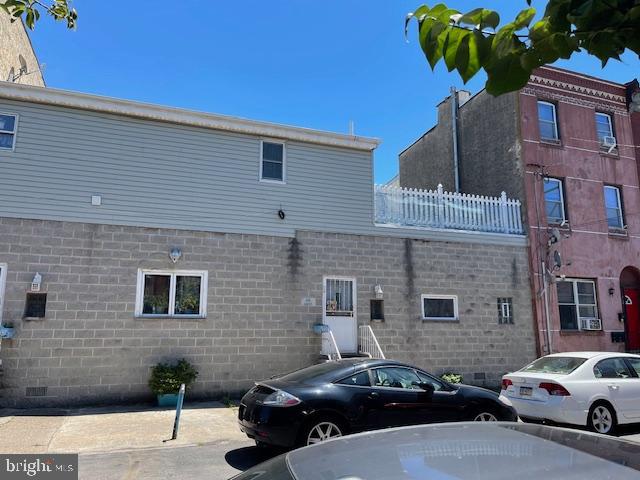 1307 South 6th Street Philadelphia, PA 19147 - Photo 3 of 30 a couple of cars parked in front of a brick building