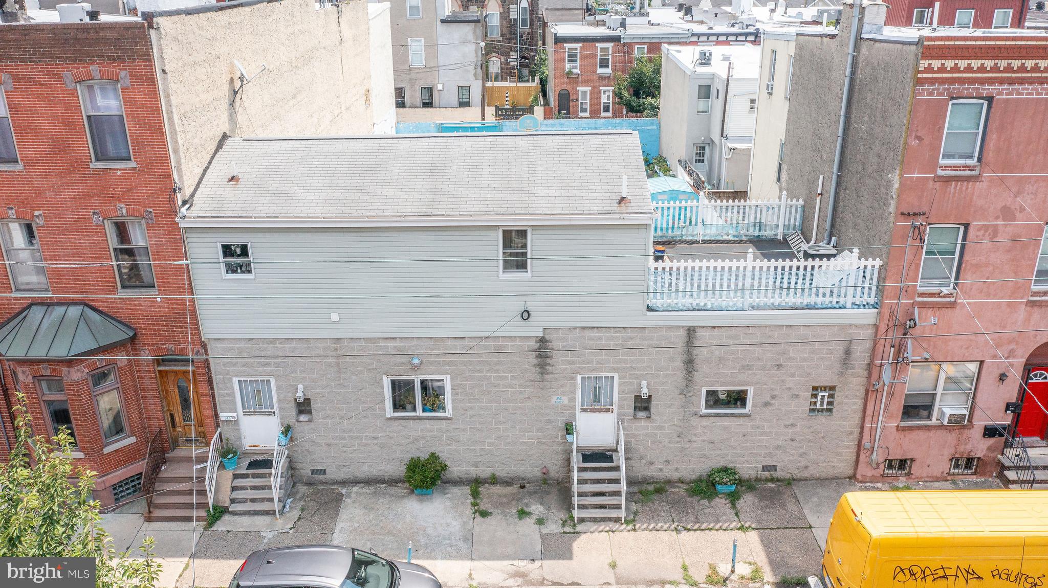 1307 South 6th Street Philadelphia, PA 19147 - Photo 4 of 30 a front view of a building with a swimming pool