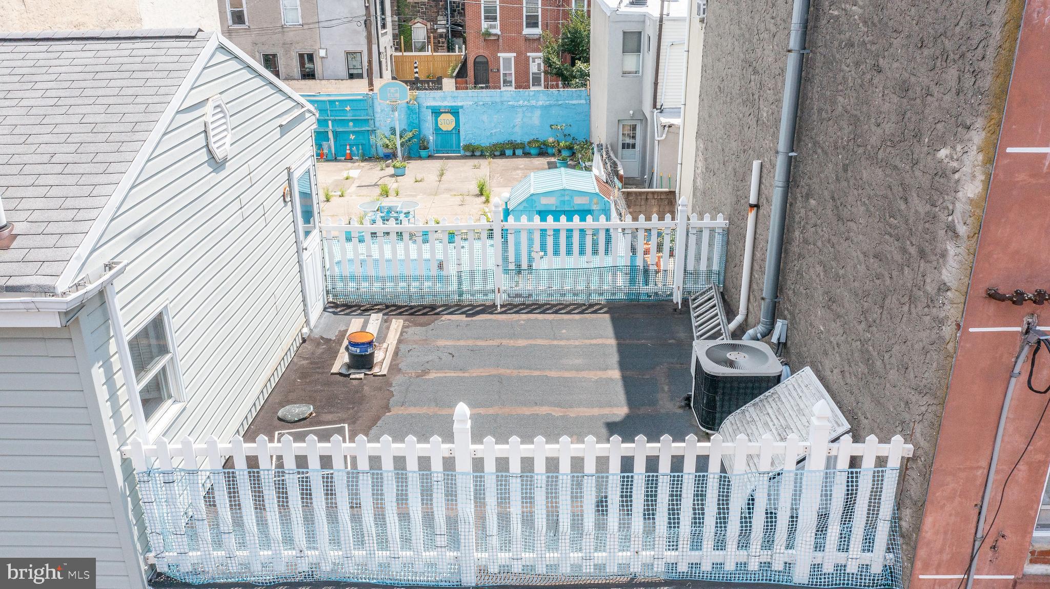 1307 South 6th Street Philadelphia, PA 19147 - Photo 7 of 30 a view of a gate with a fence