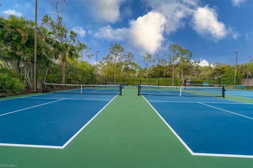 22855 Forest Ridge Drive Estero, FL 33928 - Photo 40 of 49 a view of a tennis court