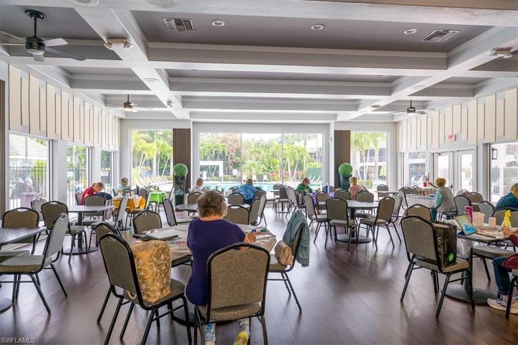 22855 Forest Ridge Drive Estero, FL 33928 - Photo 43 of 49 a view of a dining room with furniture window and outside view