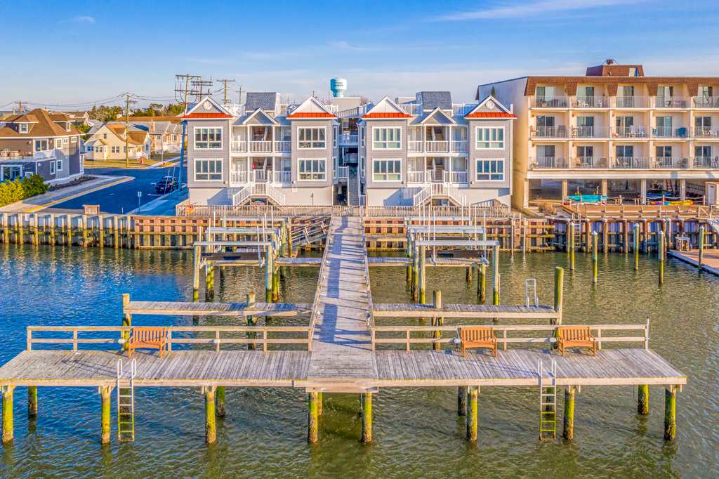 9501 Sunset Drive, Unit 11 Stone Harbor, NJ 08247 - Photo 1 of 1 a balcony with tall buildings