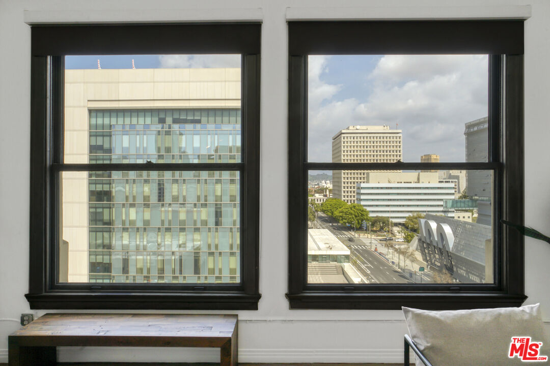 108 West 2nd Street, Unit 915 Los Angeles, CA 90012 - Photo 22 of 27 a view of a glass door with a window