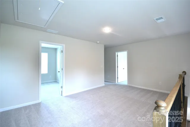 an empty room with a bathroom