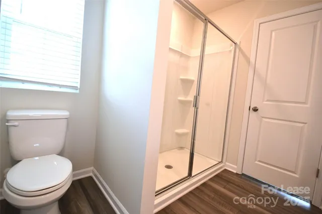 a view of a room that has a window in it