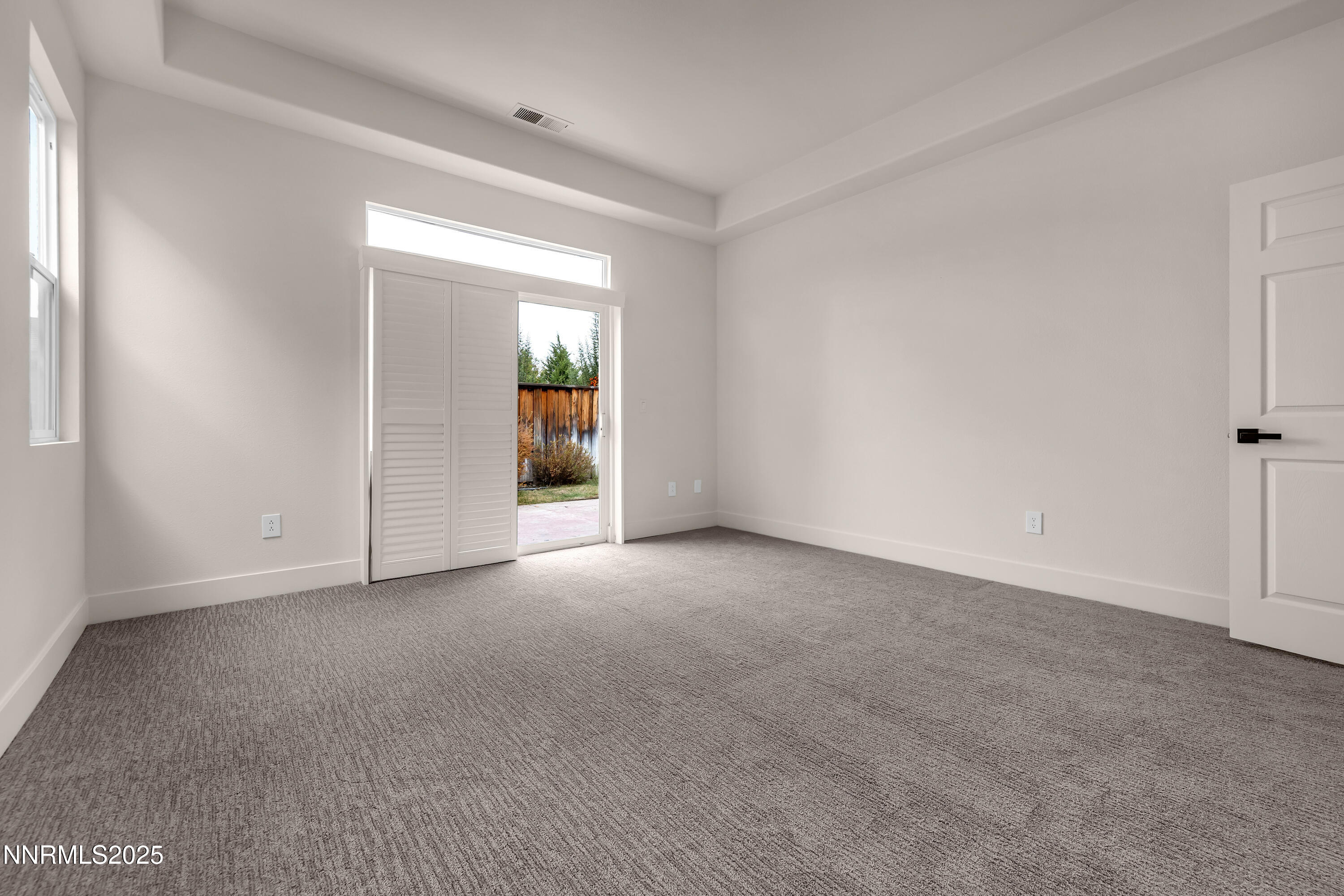 1651 Emerald Bay Drive Reno, NV 89521 - Photo 25 of 50 a view of an empty room with closet and a window