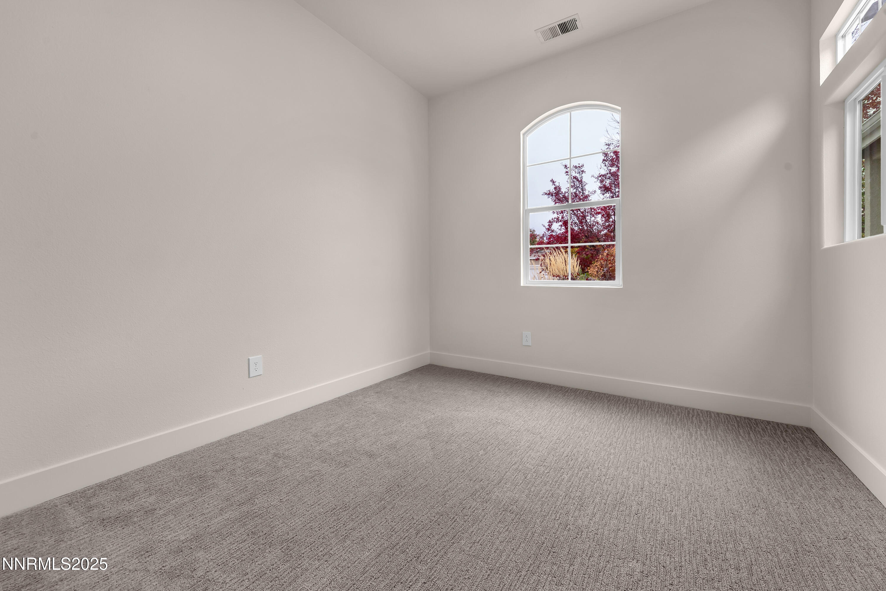 1651 Emerald Bay Drive Reno, NV 89521 - Photo 31 of 50 an empty room with a window