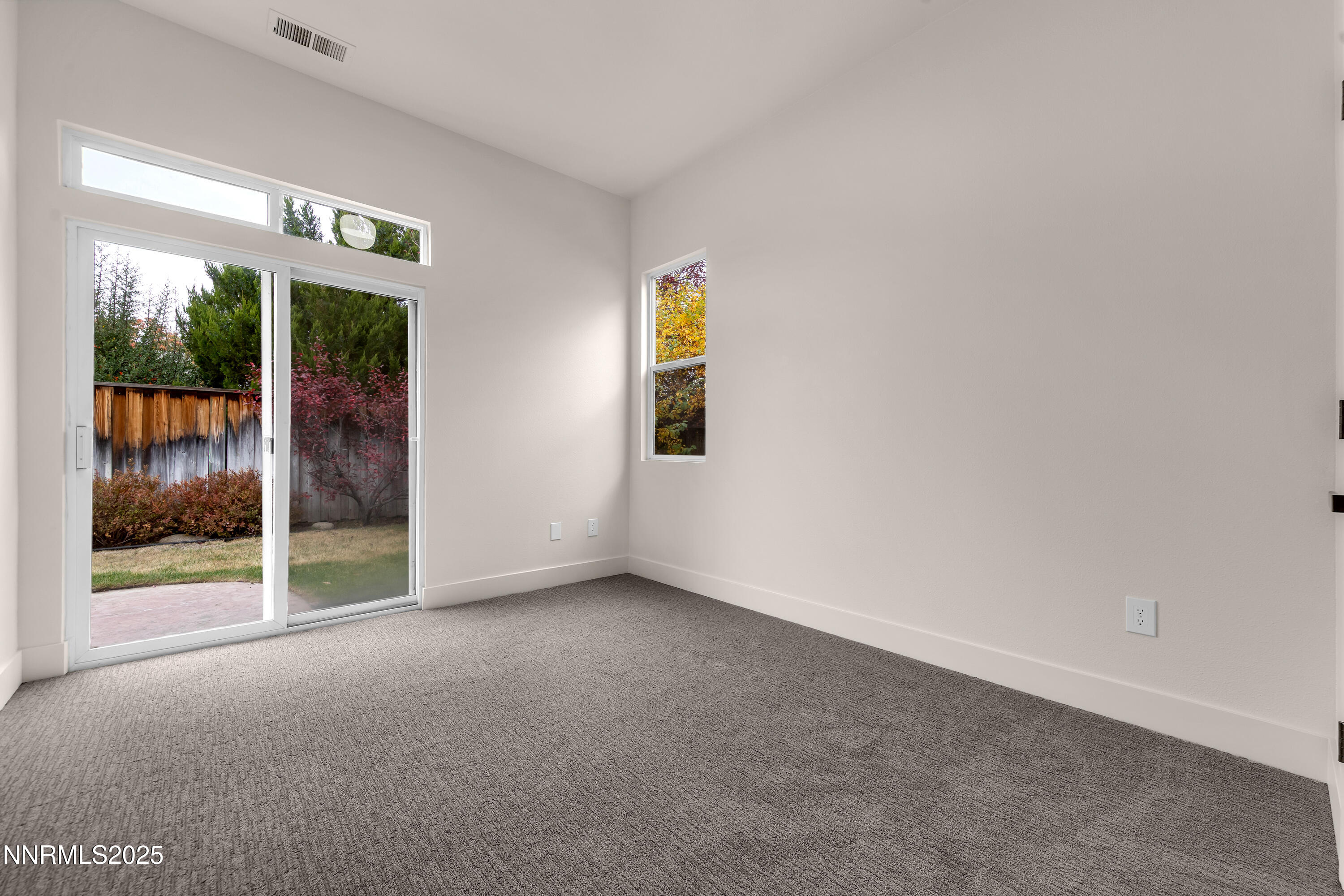 1651 Emerald Bay Drive Reno, NV 89521 - Photo 35 of 50 an empty room with windows