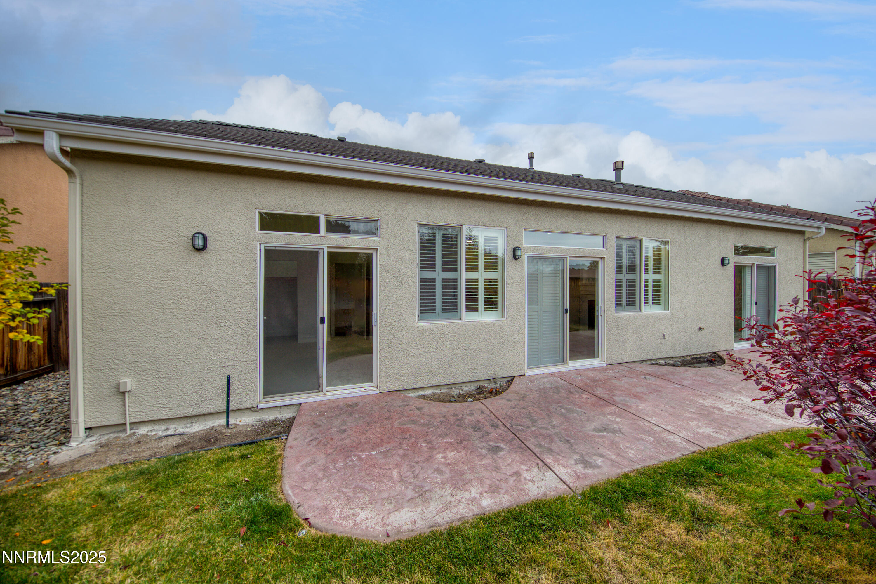 1651 Emerald Bay Drive Reno, NV 89521 - Photo 38 of 50 a front view of a house with a garden