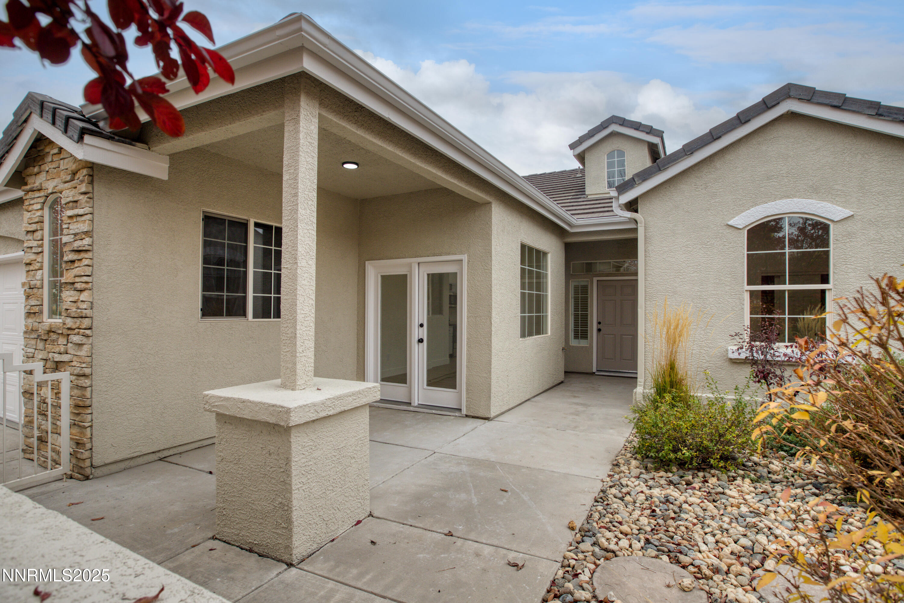 1651 Emerald Bay Drive Reno, NV 89521 - Photo 5 of 50 a view of a house with a yard and potted plants