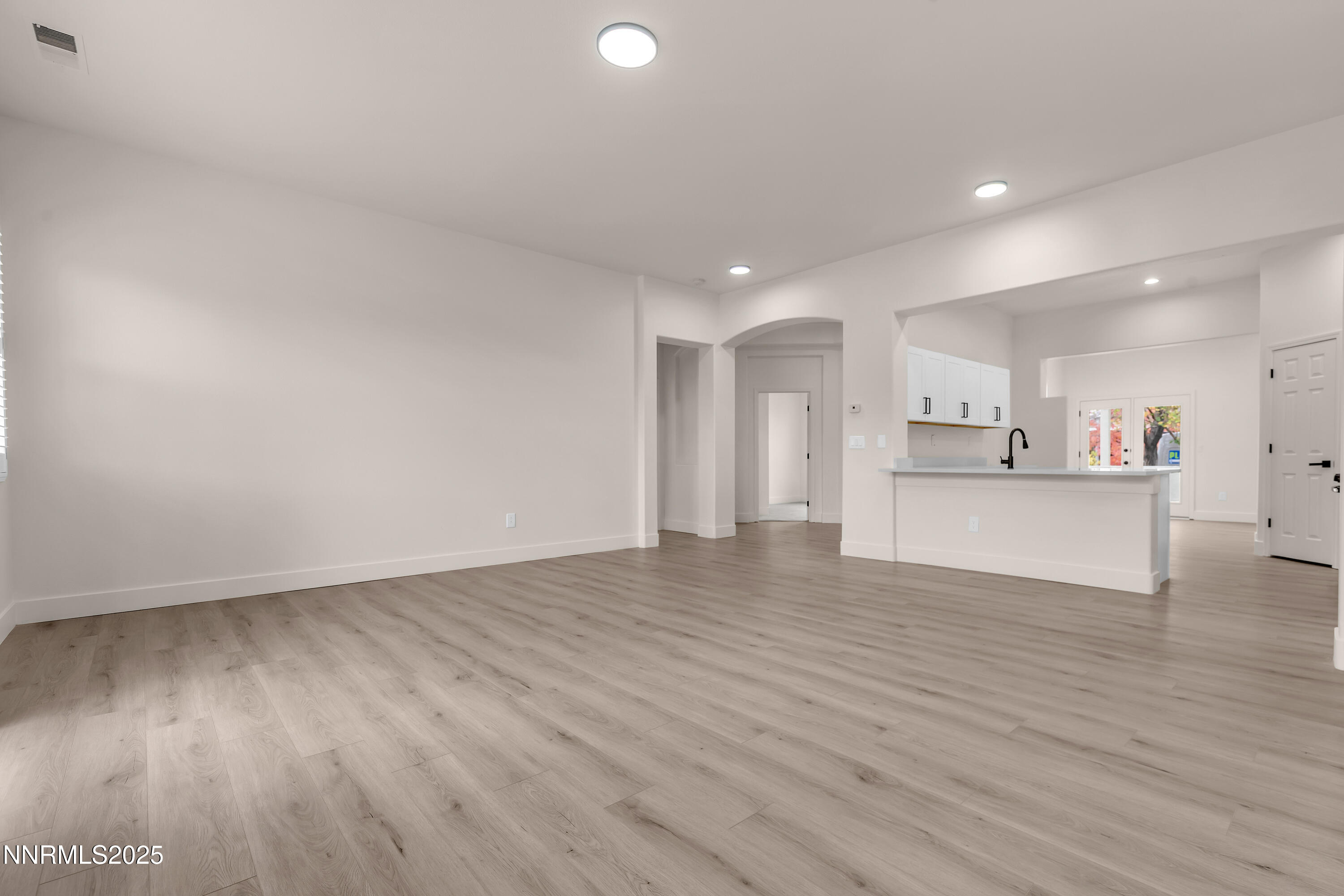 1651 Emerald Bay Drive Reno, NV 89521 - Photo 9 of 50 a view of kitchen view wooden floor and window