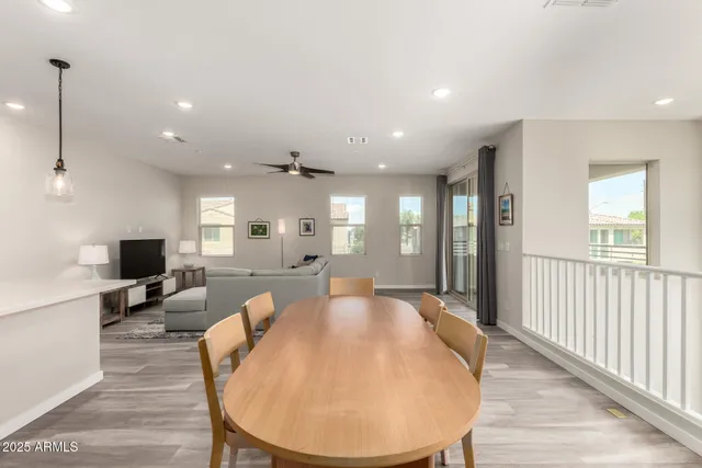 a view of a living room and dining room