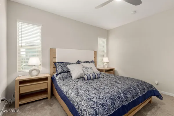 a room with a dresser and a window