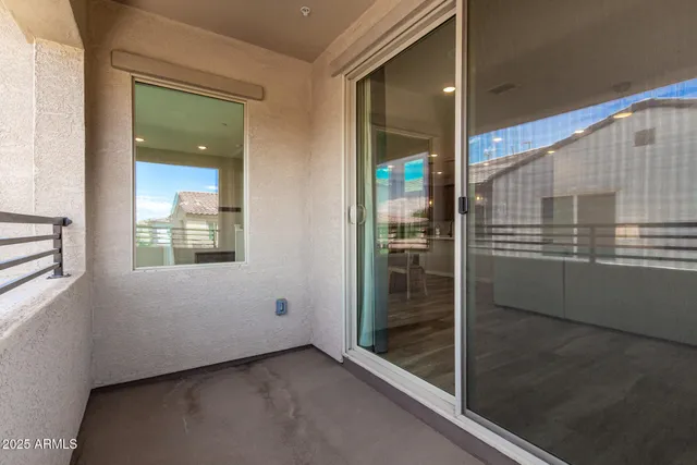 a view of a swimming pool and lounge chair