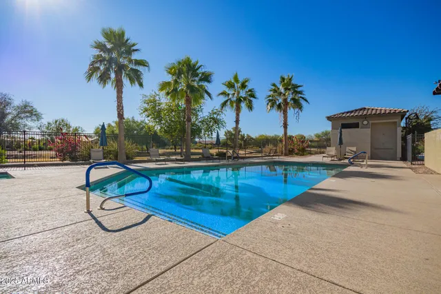 a view of a house with swimming pool