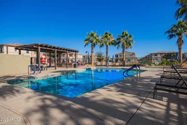 a view of outdoor space with palm trees