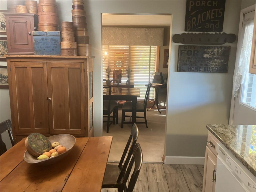 2261 Thomas Drive Irwin, PA 15642 - Photo 14 of 32 a dining room with furniture and a kitchen view