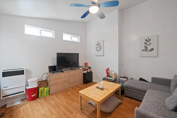 a view of balcony with wooden floor and iron stairs
