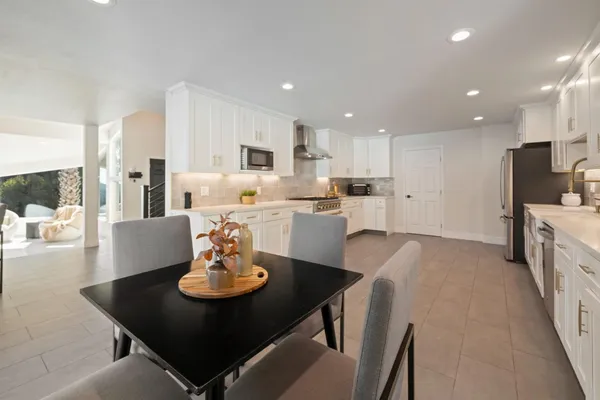 a bathroom with a tub and shower
