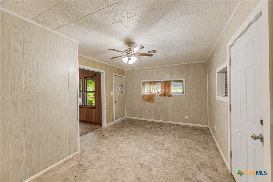 401 Kerr Street Edna, TX 77957 - Photo 11 of 23 a view of an empty room with a window