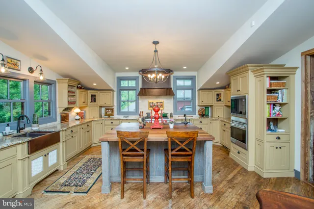 a view of a livingroom with furniture and window