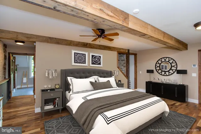 a view of a chairs and table in a balcony