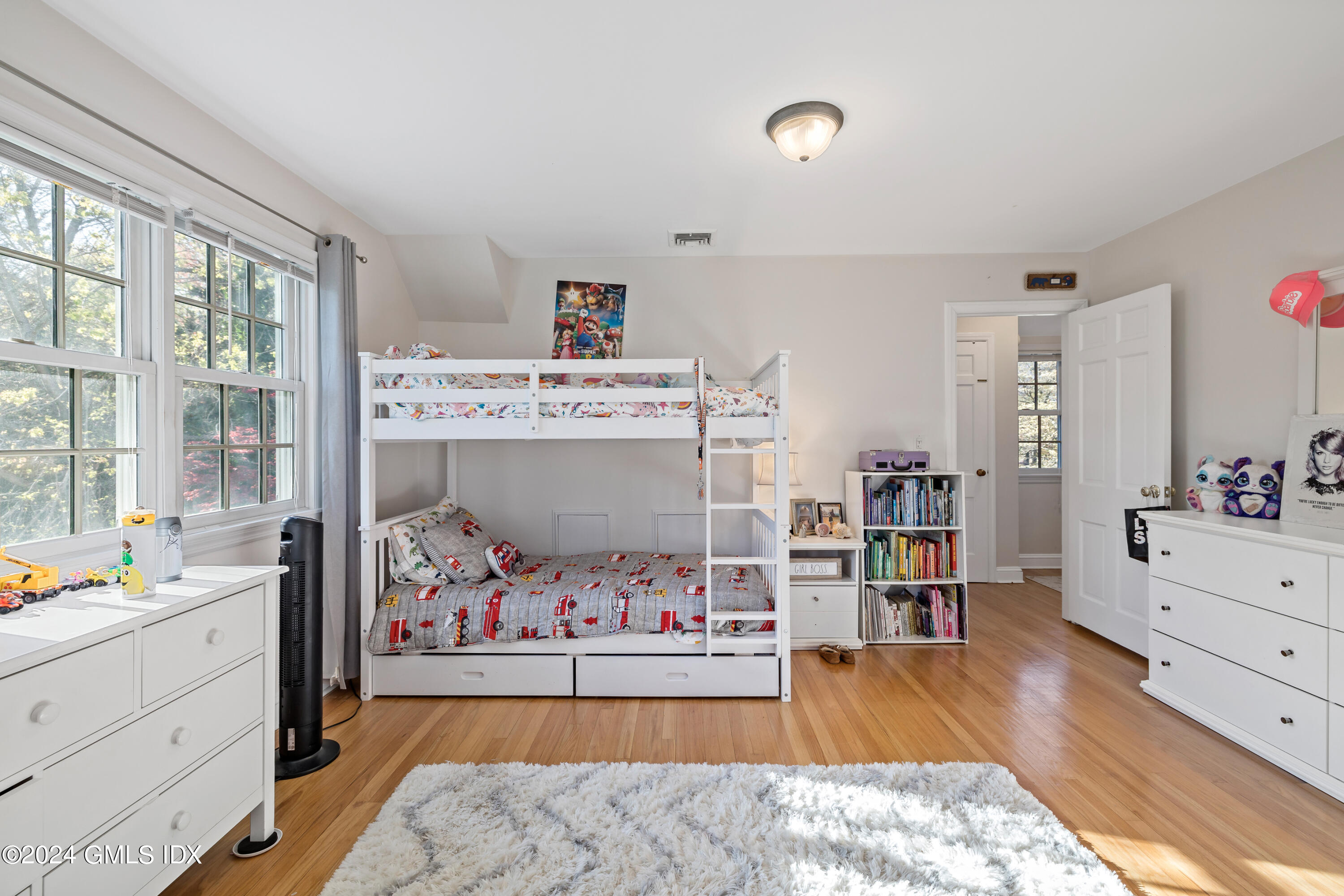 29 Park Place Darien, CT 06820 - Photo 16 of 22 a bed room with a bed and a dresser