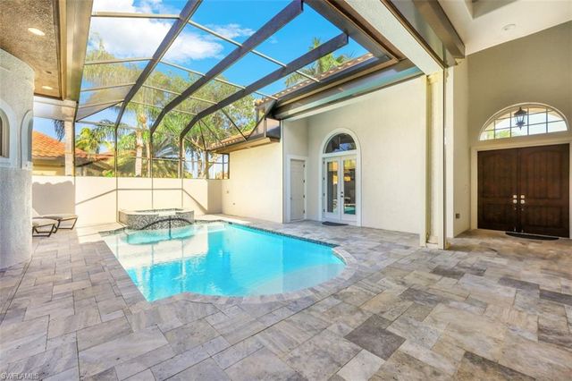 a view of a living room and bathroom