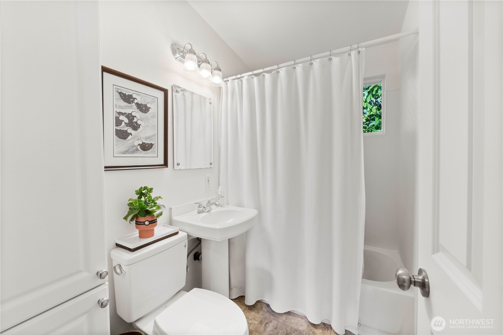 8414 John Dower Road Southwest, Unit 14 Lakewood, WA 98499 - Photo 14 of 33 a bathroom with a sink and toilet