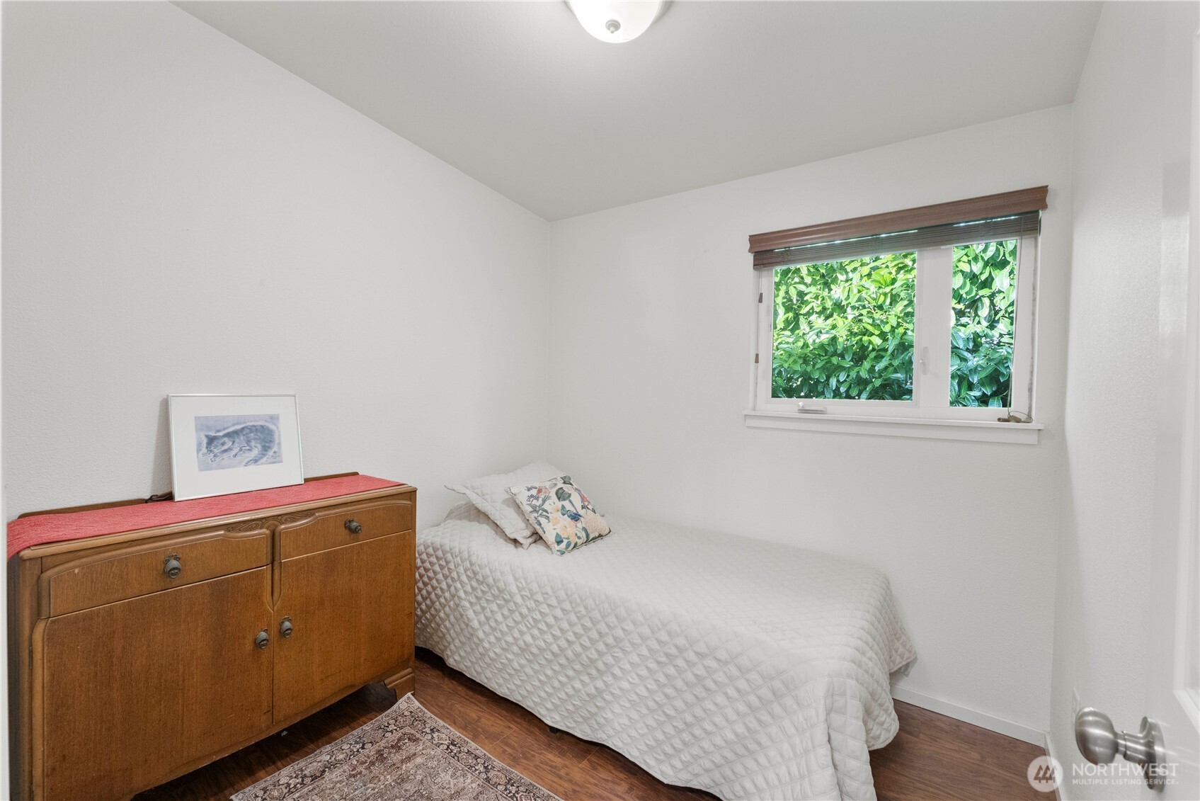 8414 John Dower Road Southwest, Unit 14 Lakewood, WA 98499 - Photo 19 of 33 a bedroom with a bed and a window