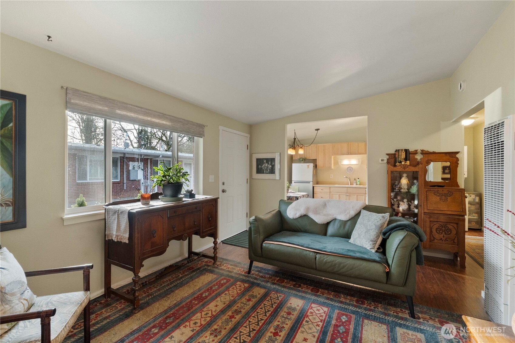 8414 John Dower Road Southwest, Unit 14 Lakewood, WA 98499 - Photo 7 of 33 a living room with furniture and a window