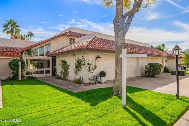 a view of a house with garden