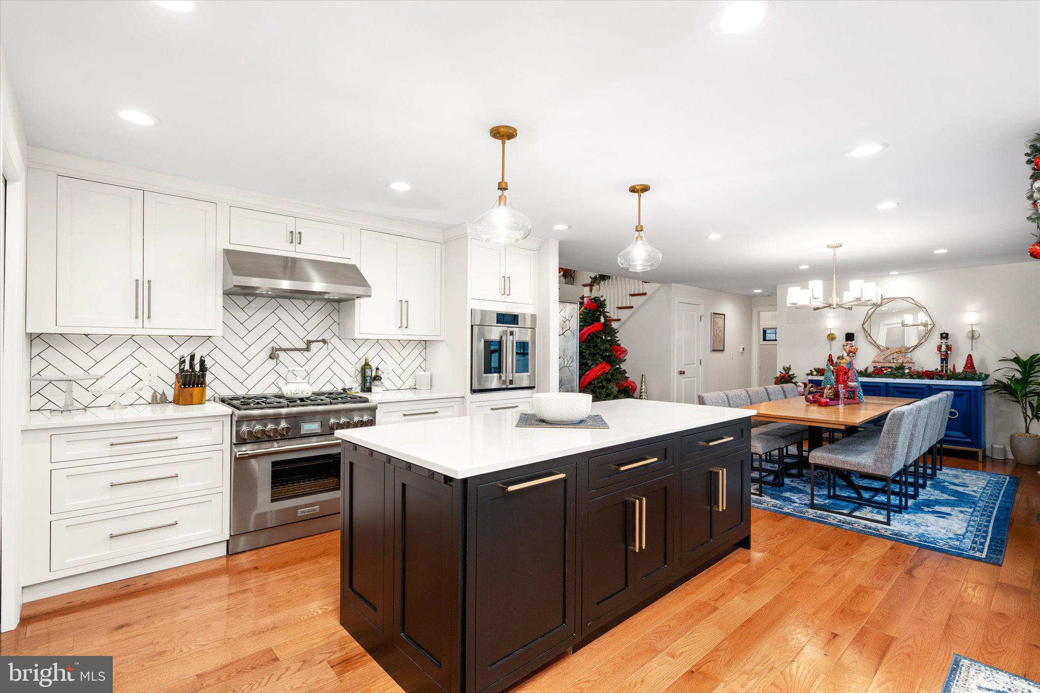 17 Tindall Road Robbinsville, NJ 08691 - Photo 35 of 53 a kitchen with a stove a sink and a refrigerator