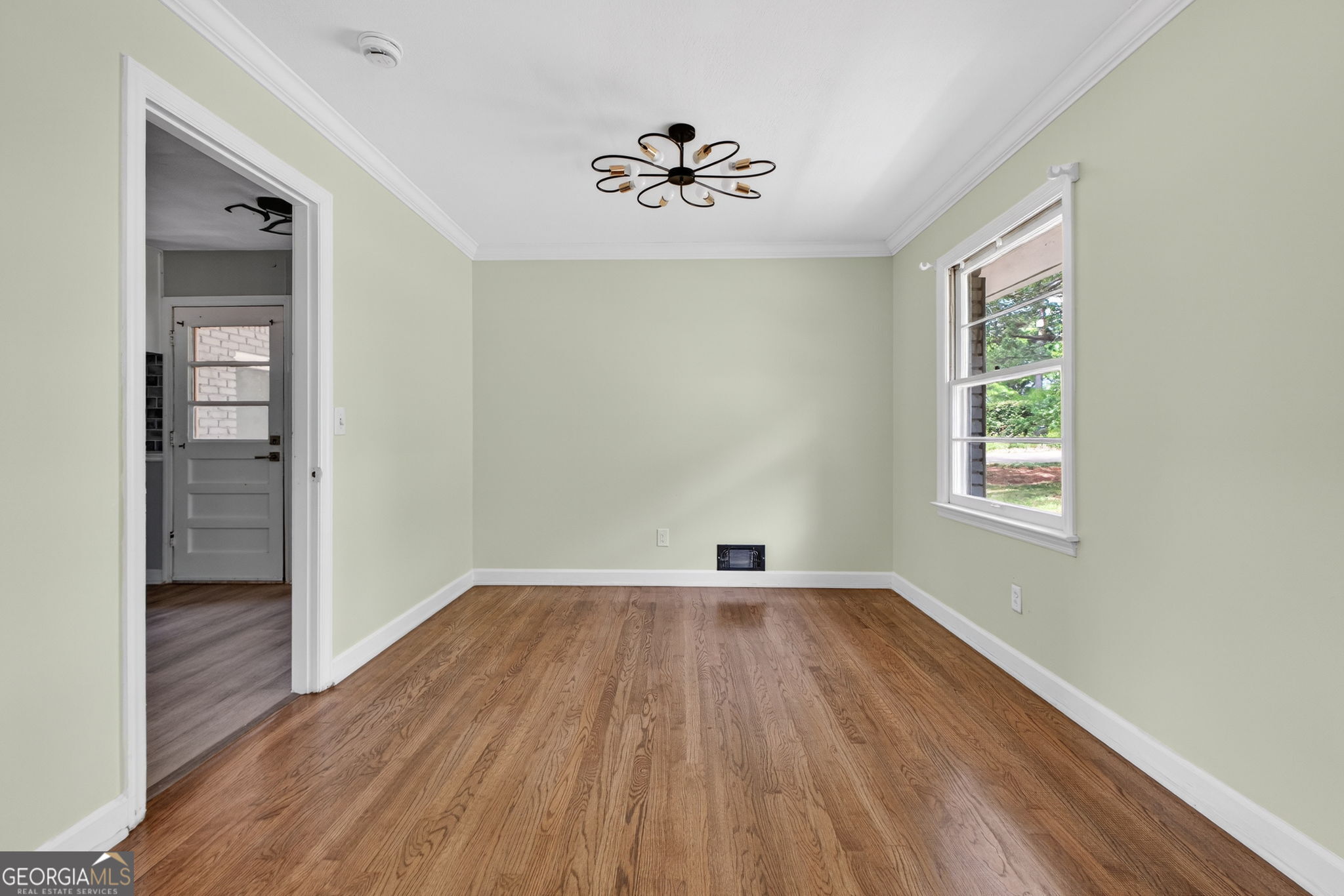 3825 Highway 81 Hampton, GA 30228 - Photo 11 of 25 wooden floor in an empty room with a window