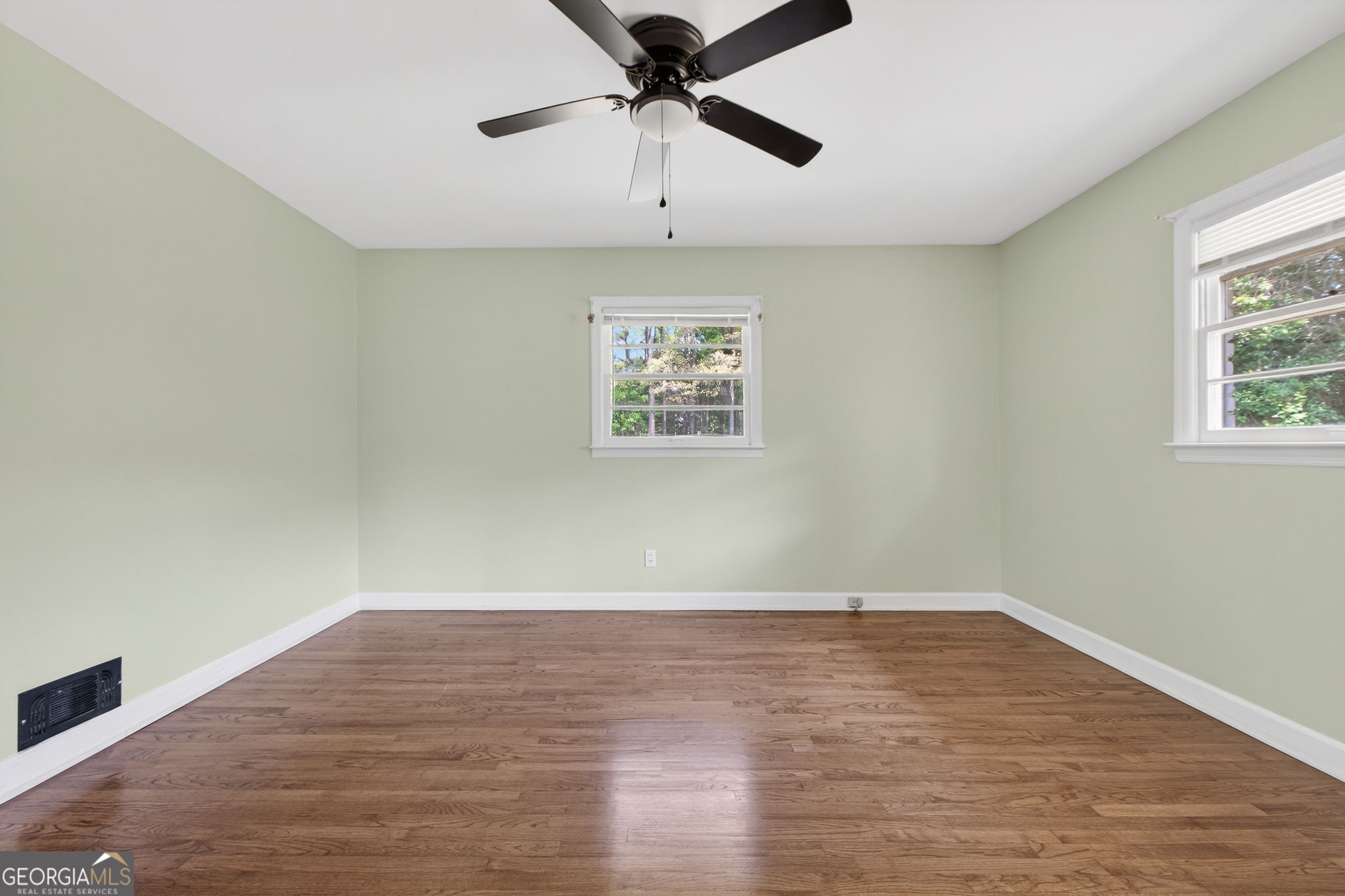 3825 Highway 81 Hampton, GA 30228 - Photo 20 of 25 wooden floor in an empty room with a window