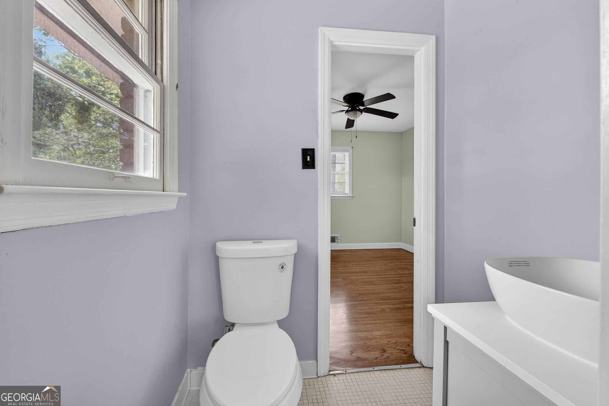 3825 Highway 81 Hampton, GA 30228 - Photo 21 of 25 a bathroom with a toilet and a sink