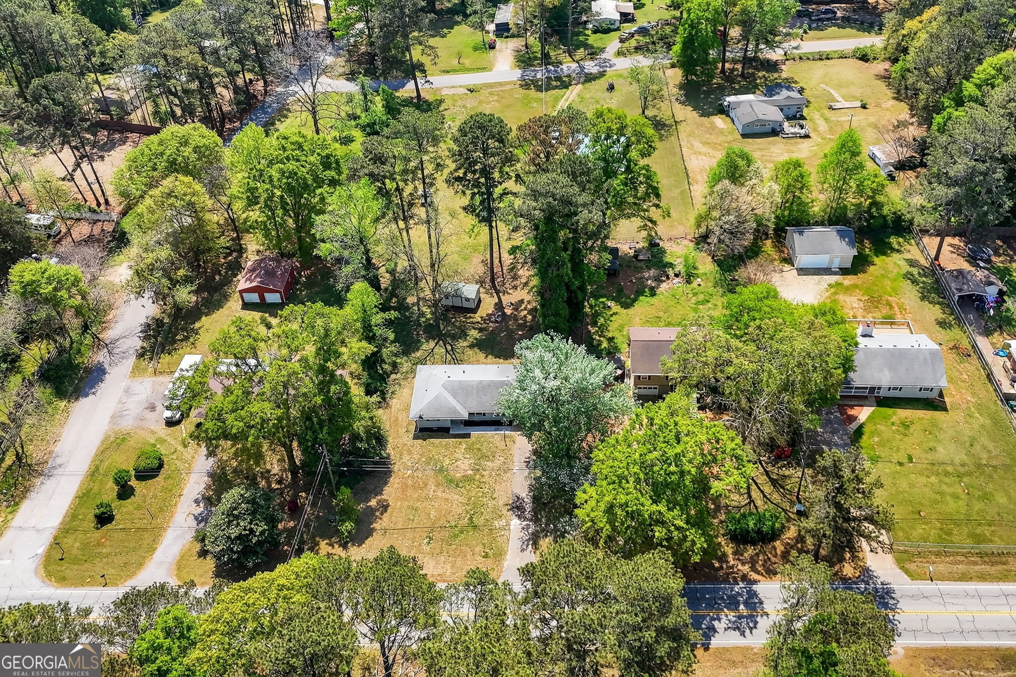 3825 Highway 81 Hampton, GA 30228 - Photo 22 of 25 an aerial view of residential houses with outdoor space