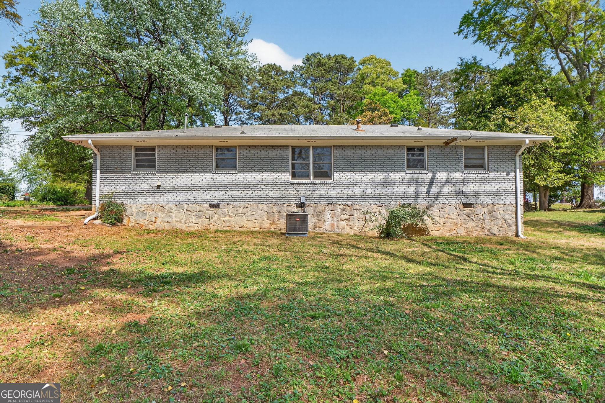 3825 Highway 81 Hampton, GA 30228 - Photo 7 of 25 a front view of a house with garden