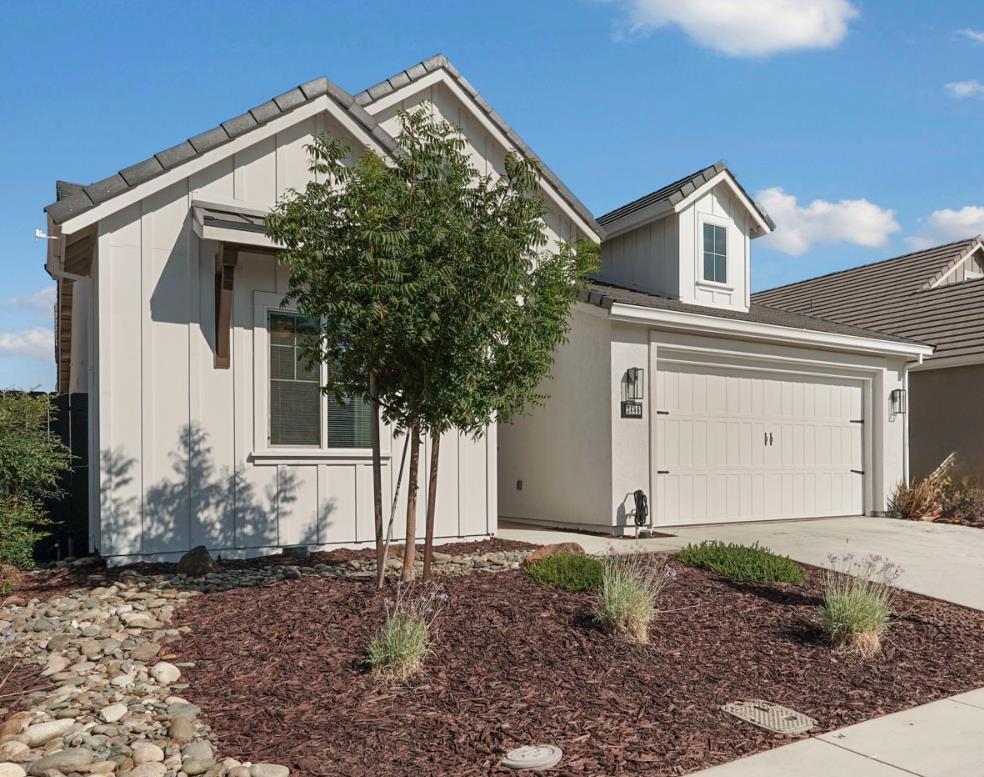 2446 Paramount Lane Manteca, CA 95337 - Photo 1 of 1 a view of a house with a yard