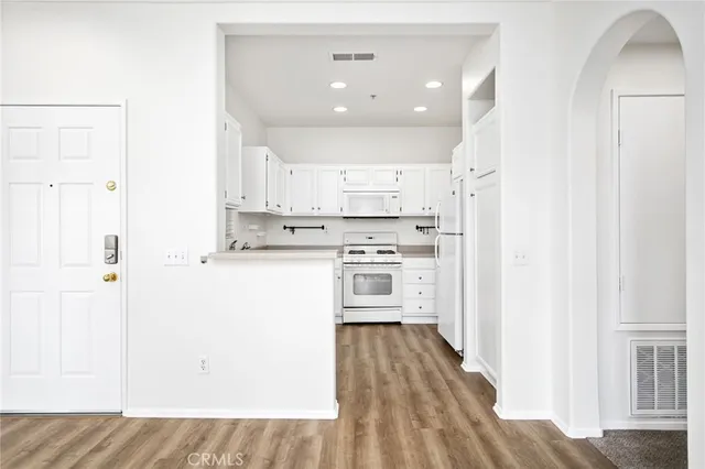a bathroom with a sink a toilet and bathtub