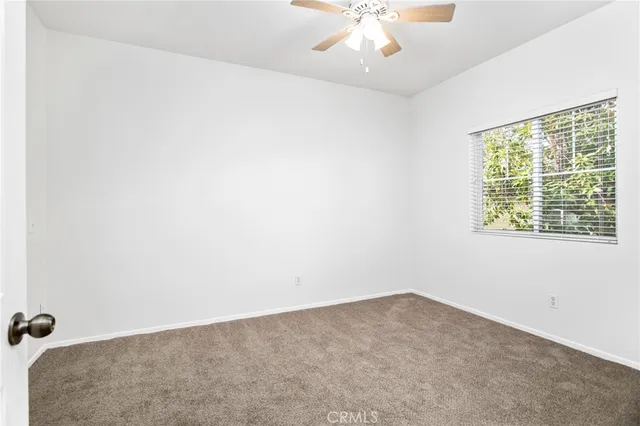 a view of a building along the street