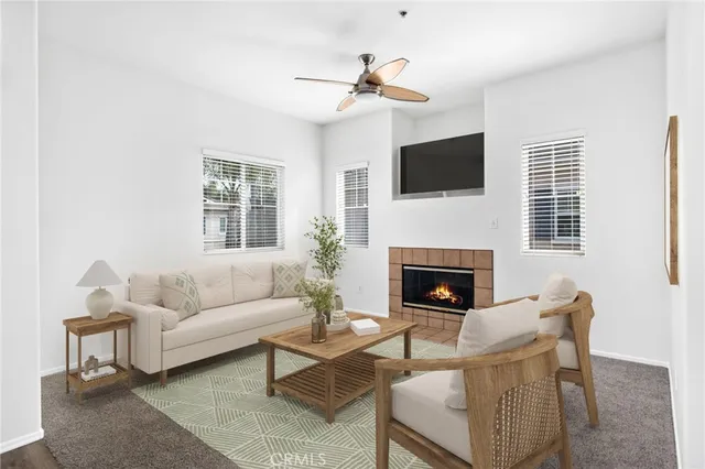 a kitchen with stainless steel appliances a refrigerator and a stove top oven