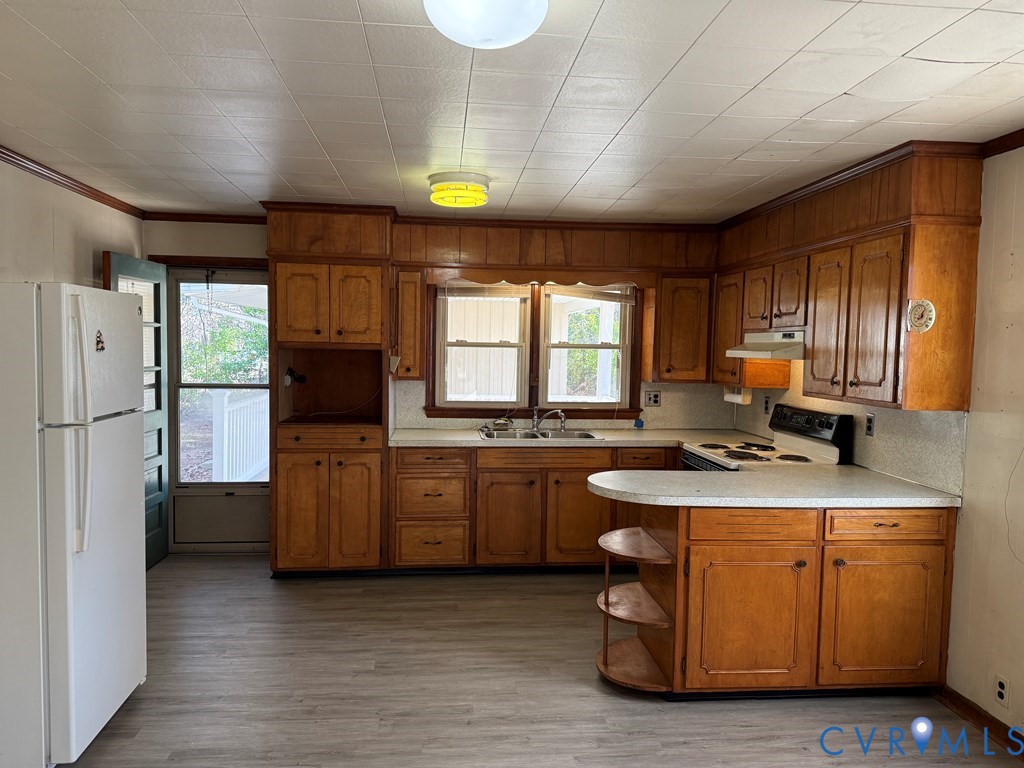 243 Tuggle Road Prospect, VA 23960 - Photo 13 of 24 a kitchen with sink cabinets and window