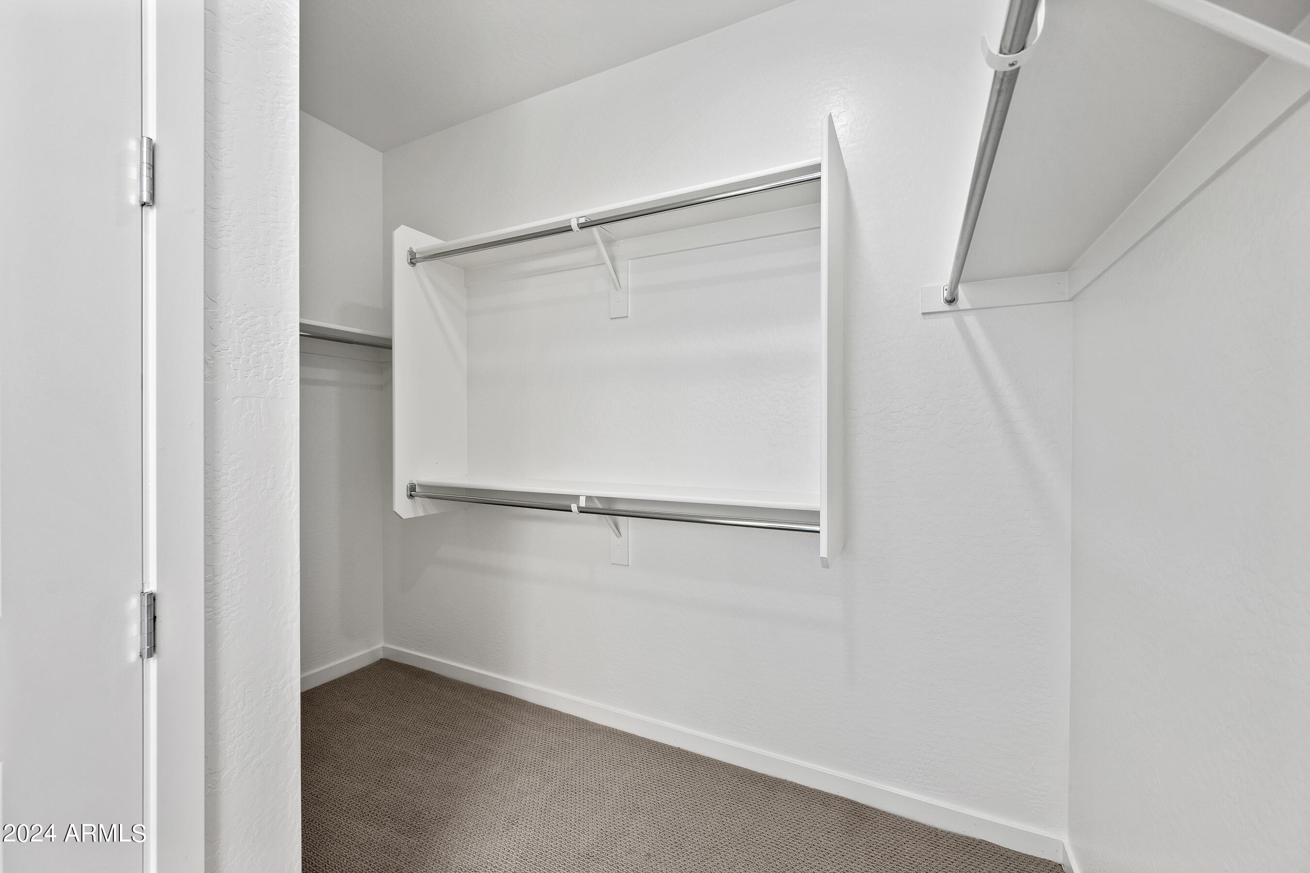 901 South Smith Road, Unit 1012 Tempe, AZ 85281 - Photo 12 of 27 1012 - Primary bedroom walk in closet