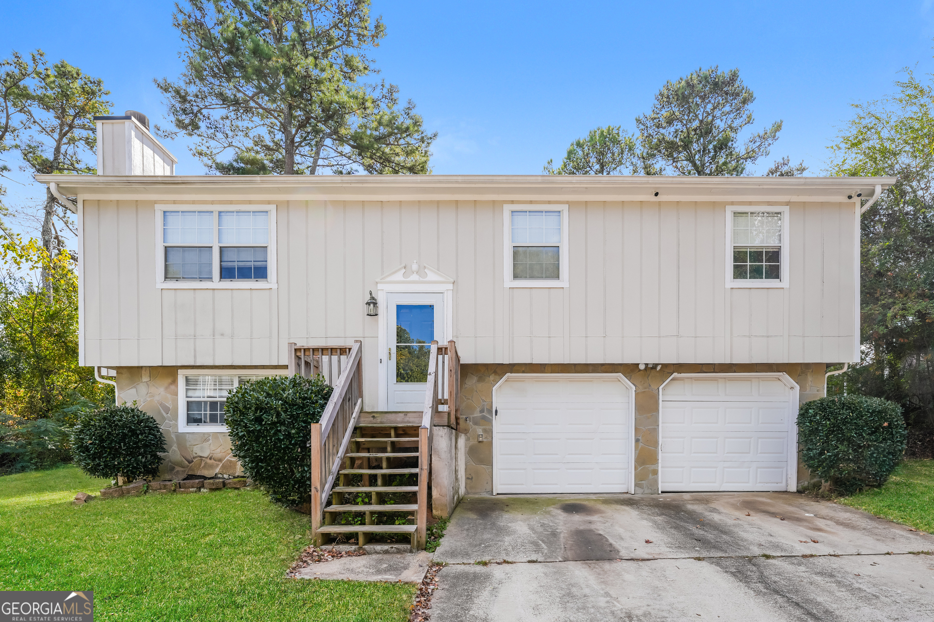 5591 Sapphire Spring Stone Mountain, GA 30088 - Photo 1 of 17 front view of a house with a yard