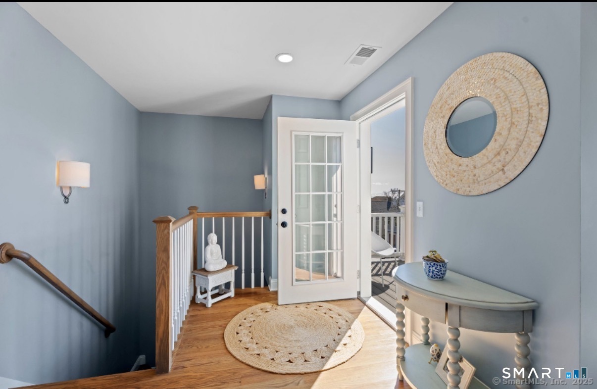 9 4th Avenue Branford, CT 06405 - Photo 11 of 22 a view of a livingroom with furniture and front door