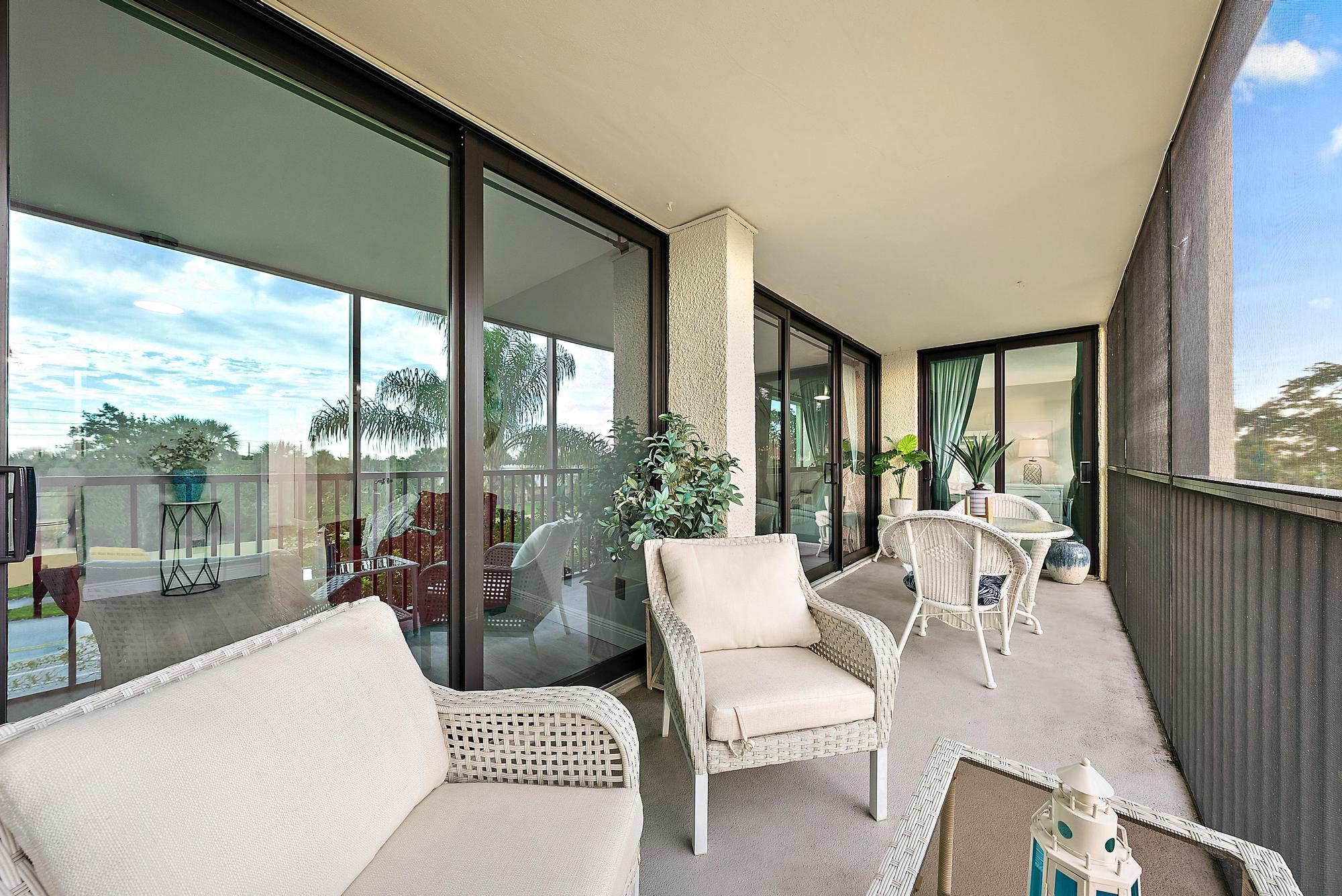 1605 Highway 1, Unit 303M1 Jupiter, FL 33477 - Photo 19 of 31 Covered Lanai