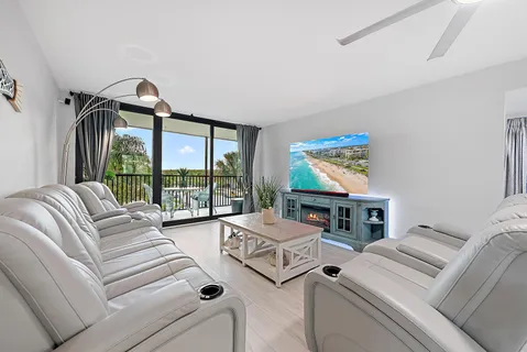 a kitchen with granite countertop a stove top oven and sink