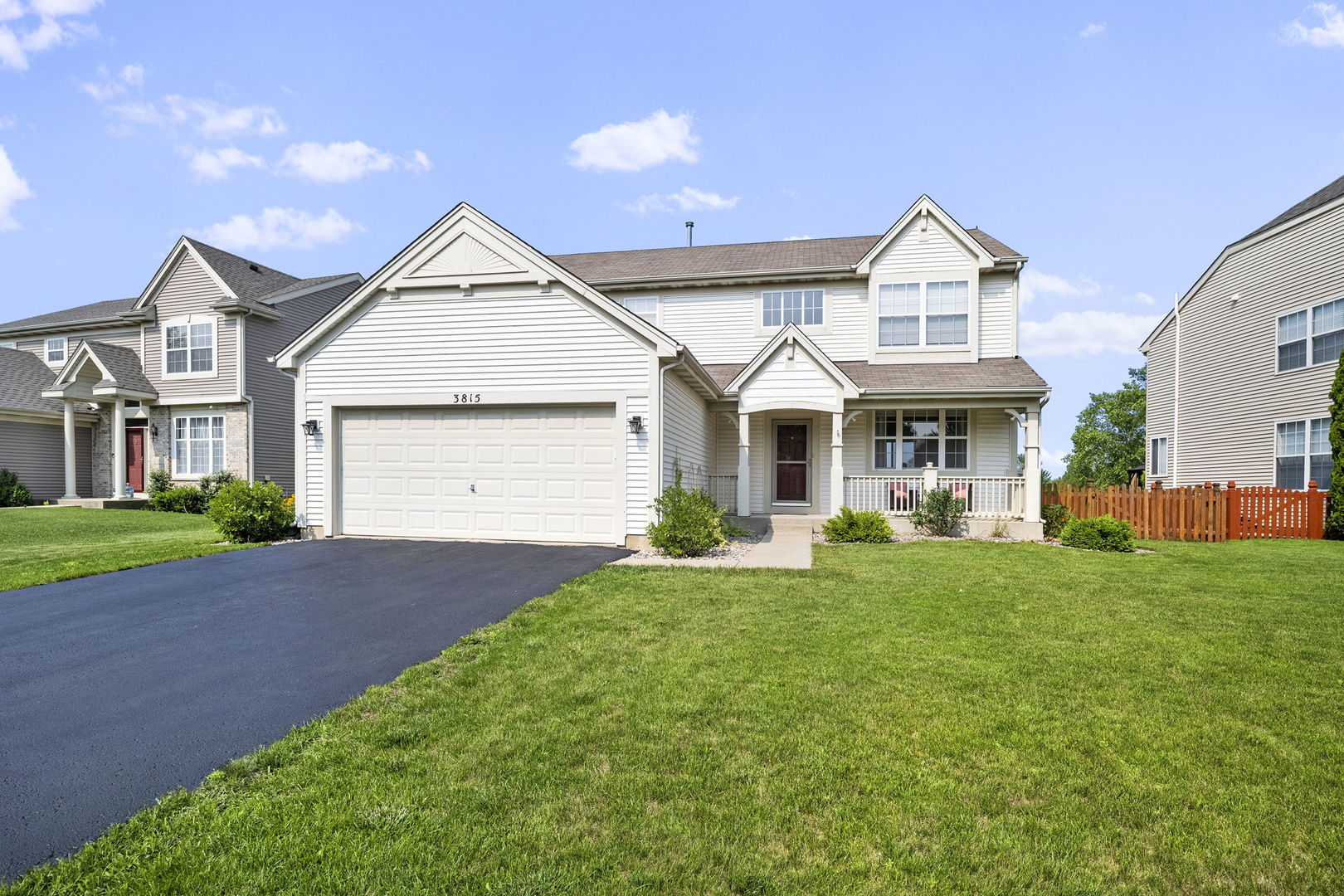 3815 Cherry Tree Lane Joliet, IL 60435 - Photo 1 of 37 a front view of a house with yard and green space